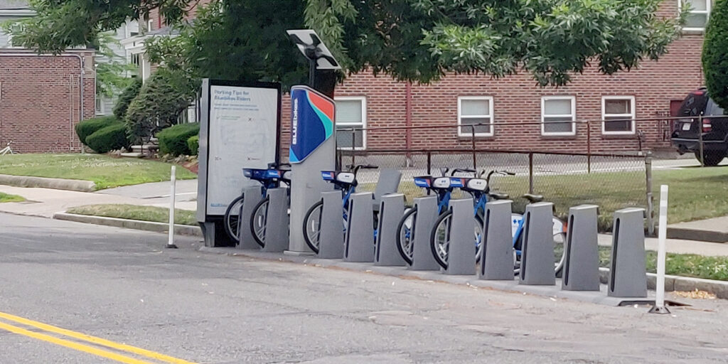 A bluebikes station.  The station has docking spaces for eleven bicycles.